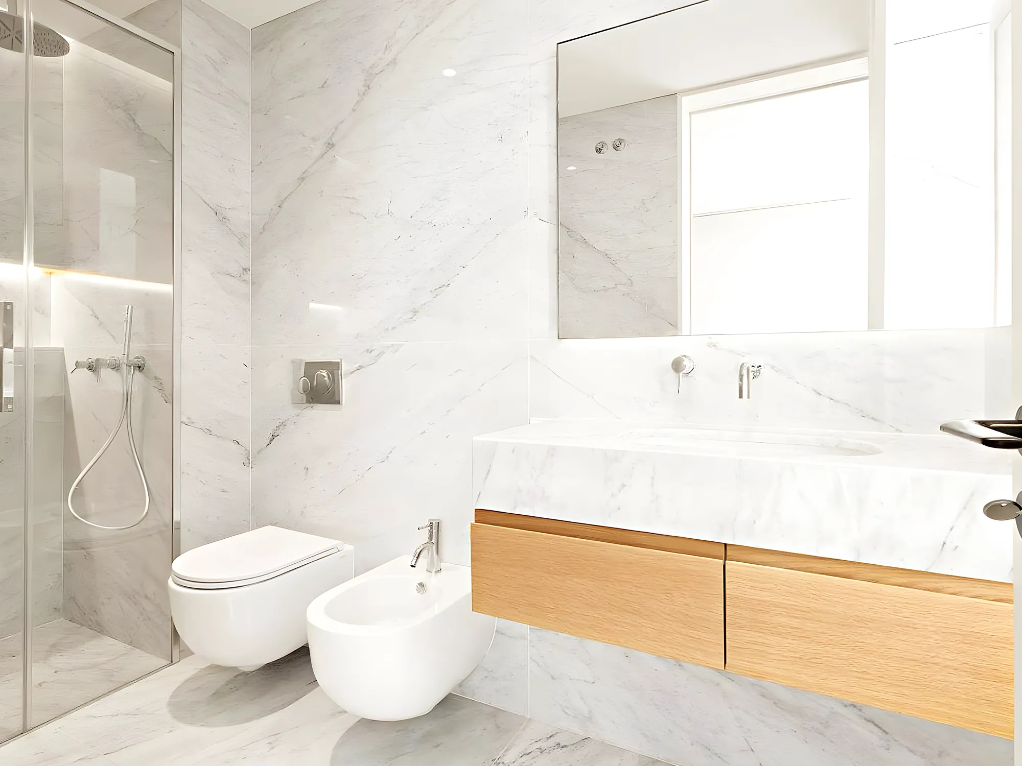Marble bathroom with timber vanity and natural light — bathroom renovation in Fuengirola